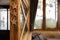 Fragment of the interior of an Alpine restaurant in Austria, view with a window to the mountains