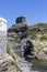 Fragment of the Kastro fortress and arched bridge on Andros Island Greece, Cyclades