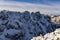 A fragment of the Main Ridge of the Tatra Mountains in the snow rime on a beautiful sunny and frosty day. Among the peaks, among