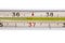 Fragment of medical mercury thermometer showing normal human body temperature