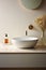Fragment of minimalist bathroom with white wall, Terrazzo stone countertop, white sink, wall mounted faucet, elegant