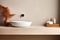 Fragment of minimalist bathroom with white wall, Terrazzo stone countertop, white sink, wall mounted faucet, elegant