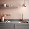 Fragment of modern classic kitchen. Gray countertop with built-in sink and gold faucet. Peach tone wall with open shelf