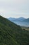 Fragment of the mountainous terrain in the Carpathians, Ukraine. The forest is forgiven by the reliefs of the Carpathian Mountains