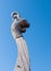 Fragment of the nose of a medieval viking ship against the blue sky