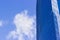 Fragment of the office building against the sky with cloud