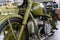 Fragment of an old military motorcycle. A khaki military motorcycle