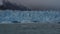 Fragment of the Perito Moreno glacier. A wall of cracked blue ice