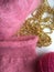 Fragment pink fluffy knitting sweater made from natural wool
