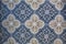 Fragment of portuguese traditional tiles Azulejo with pattern in old Porto