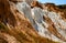 A fragment of a quarry of kaolin mining with beautiful slopes