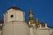 Fragment of the retaining wall of the Kiev Pechersk Lavra. Behind the wall you can see the golden domes of the Orthodox church