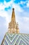 Fragment of Saint Stephen`s Cathedral Stephansdom. Colorful roof and tower. Wien. Vienna. Austria.