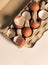 Fragment, shell halves of broken eggs in cardboard cells, top view, flat layout, close-up, aerial photography, food