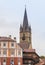 Fragment of Small Square with clocktower of Lutheran Cathedral of Saint Mary in a rainy day in Sibiu city in Romania