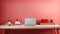 Fragment of stylish minimalist monochrome interior of modern office room in pastel carmine red and pink tones. Large