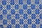 A fragment of the texture of a white-blue tablecloth made in the 1960s in Ukraine. Traditional national ornament