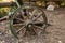 Fragment of wheels Old iron black agricultural plow