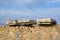 Fragments of ancient buildings, ruins of the ancient city of Hierapolis. Stone blocks with traces of stone machining