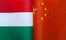 Fragments of the national flags of Hungary and China in close-up