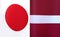 Fragments of the national flags of Japan and Latvia