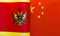 Fragments of the national flags of Montenegro and China