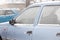 Fragments of parked cars covered with snow