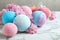 Fragrant bath bombs and sakura flowers on white marble table