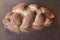 Fragrant braided bread with brown  crust isolated