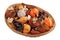 Fragrant dried tropical nuts and fruits in a basket isolated