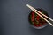 fragrant fish sauce on a black stone background.