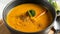 Fragrant Homemade Pumpkin Soup tasty. Fresh carrot ginger soup. Food recipe background. Close up