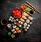 Fragrant sushi rolls with salmon, shrimp and vegetables