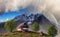 A-frame Cabin home on top of a mountain with beautiful view on rugged peaks