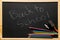 Frame chalkboard texture back to school board display for background. chalk traces erased with copy space for add text or graphic