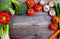 Frame of differentvegetables on wooden table