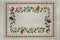 Frame with embroidered satin stitch patterns of branchlets with leaves, and red, blue, purple,cornflowers on the cotton fabric