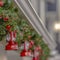 Frame Frame Square Exterior of a festive house decorated with a traditional Christmas garland