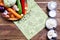 Frame of fresh vegetables and dairy products on wooden background.