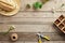 Frame of gardening tools and flowers on vintage wooden table. Gardening or planting concept. Working in the spring garden. Flat