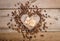 Frame- heart from coffee beans and small parcel inside it
