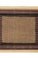 Frame made of burlap lying on a bamboo mat in the form of manuscript