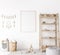 Frame mock up in farmhouse baby room, natural wooden furniture in nursery design