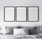 Frame mockup in modern bedroom design, three black frames on bright white wall