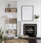 Frame mockup with plants standing on fireplace, white living room interior