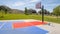 Frame Outdoor public basketball court with home mountain and blue sky background