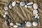 Frame of stones on a background of sand closeup