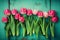 Frame of tulips on turquoise rustic wooden background. Spring flowers. Neural network AI generated