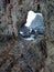 Frame view through a hole in a rock. Waves bounces against coast rocks