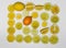 Frame of whole lemons of various varieties and pieces of lemons on a white background